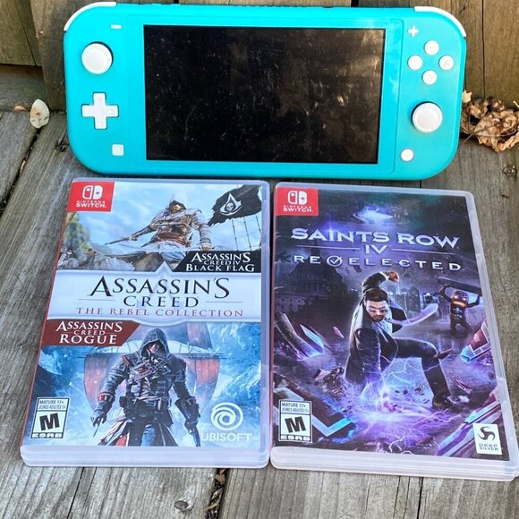 Nintendo Switch Lite Blue Bundle With 2 Games - Assassins Creed & Saints Row - Picture 6 of 7